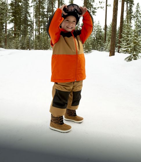 Woman outdoors in the snow wearing Merrell boots